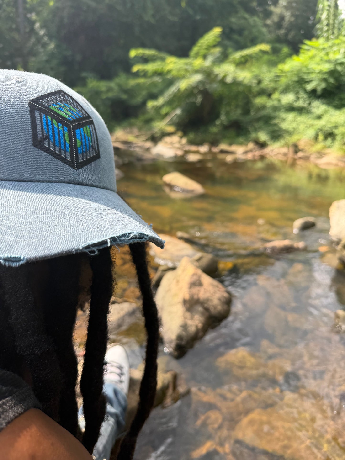 EARTH IN A CAGE HAT