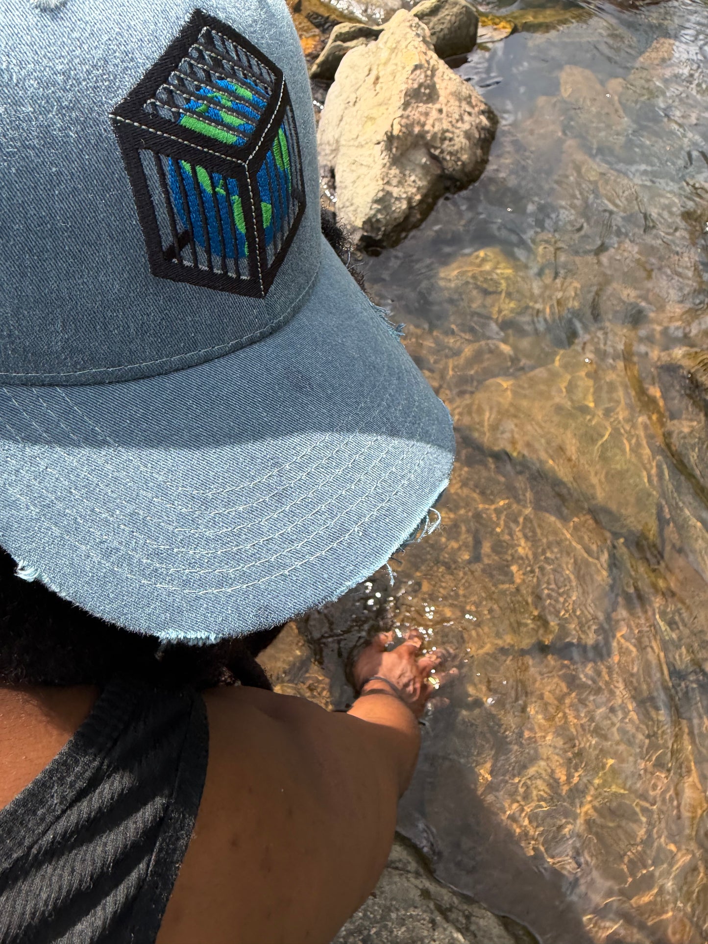 EARTH IN A CAGE HAT
